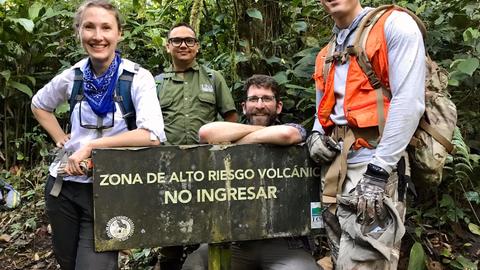 Costa Rica ELEVATE team with volcano sign